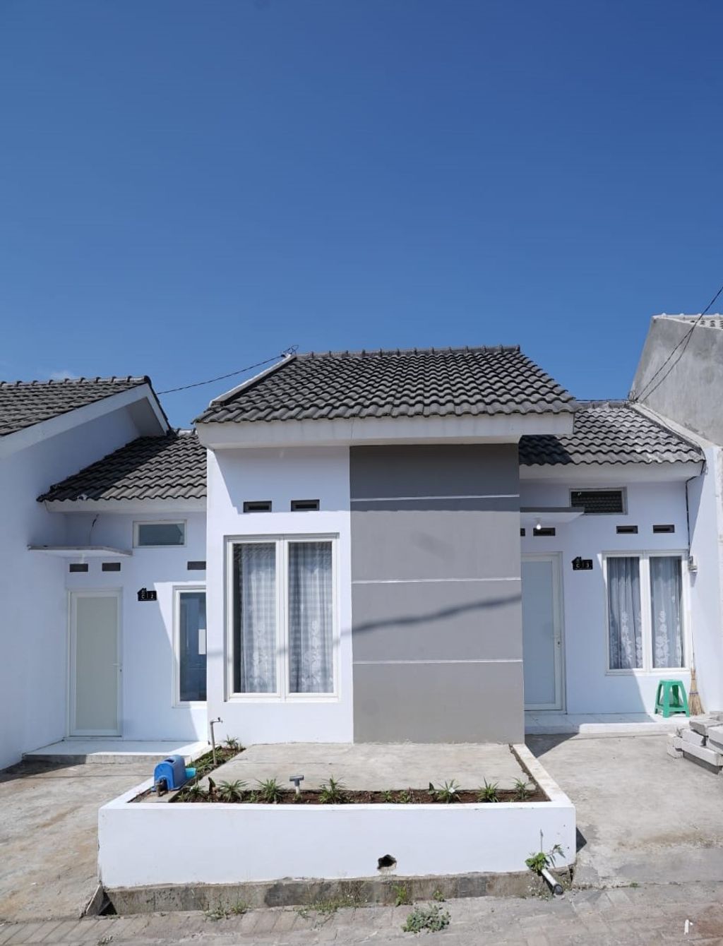 foto tampak rumah tipe ACACIA perumahan The Leaf Platinum