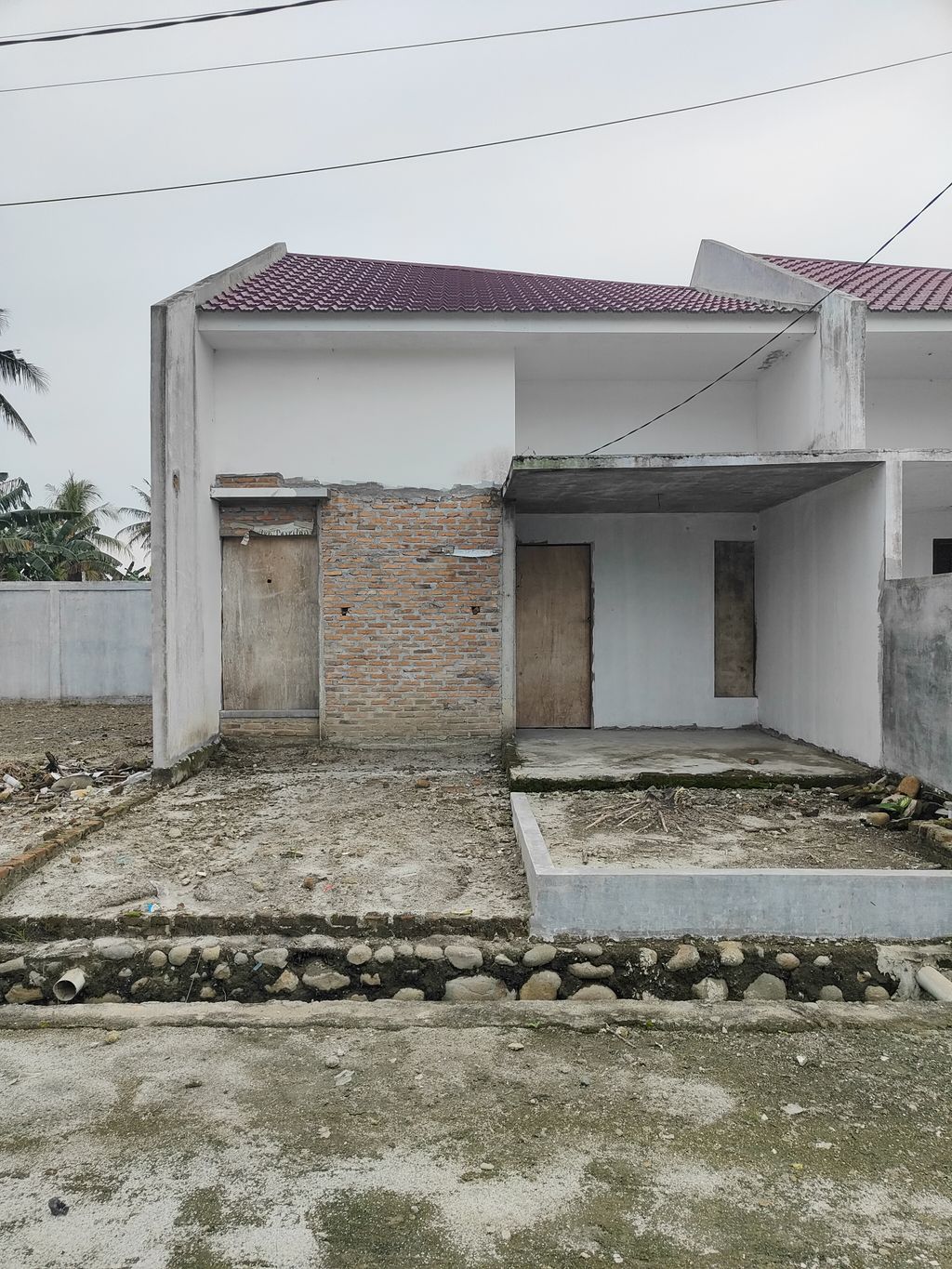 foto contoh rumah perumahan SUN RISE GARDEN PERBAUNGAN