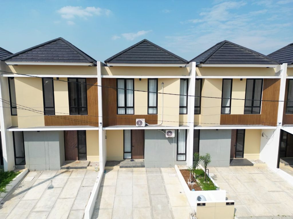 foto tampak rumah tipe 70 perumahan KAYU MANIS RESIDENCE