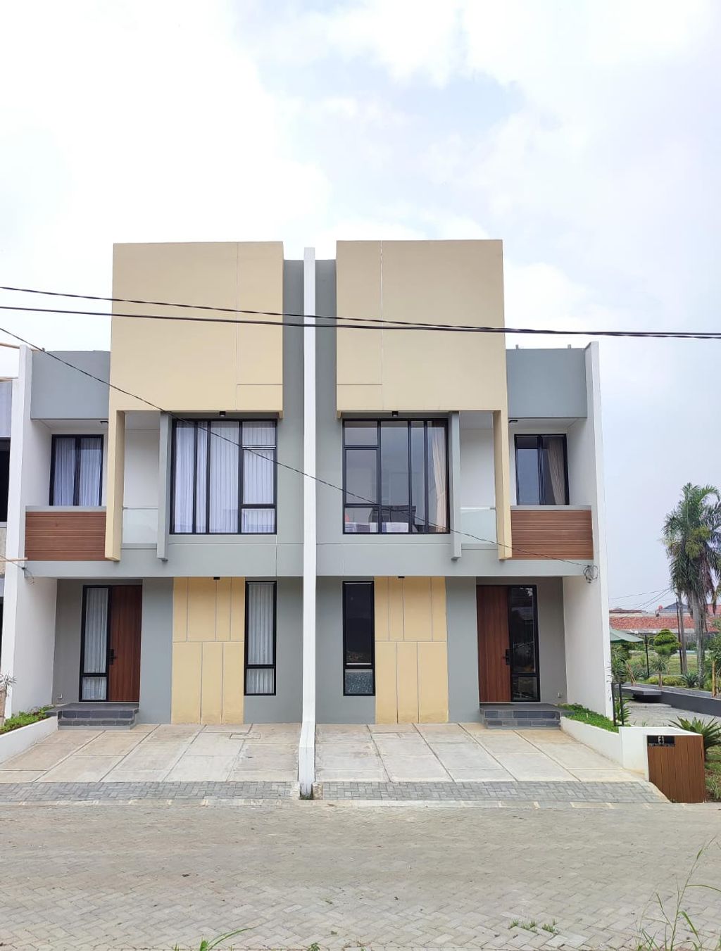 foto tampak rumah tipe 88 perumahan KAYU MANIS RESIDENCE
