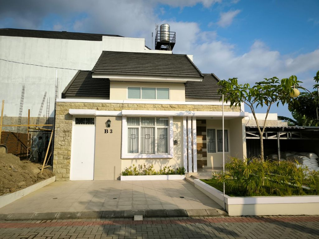 foto tampak rumah tipe 54 perumahan Pesona nogotirto