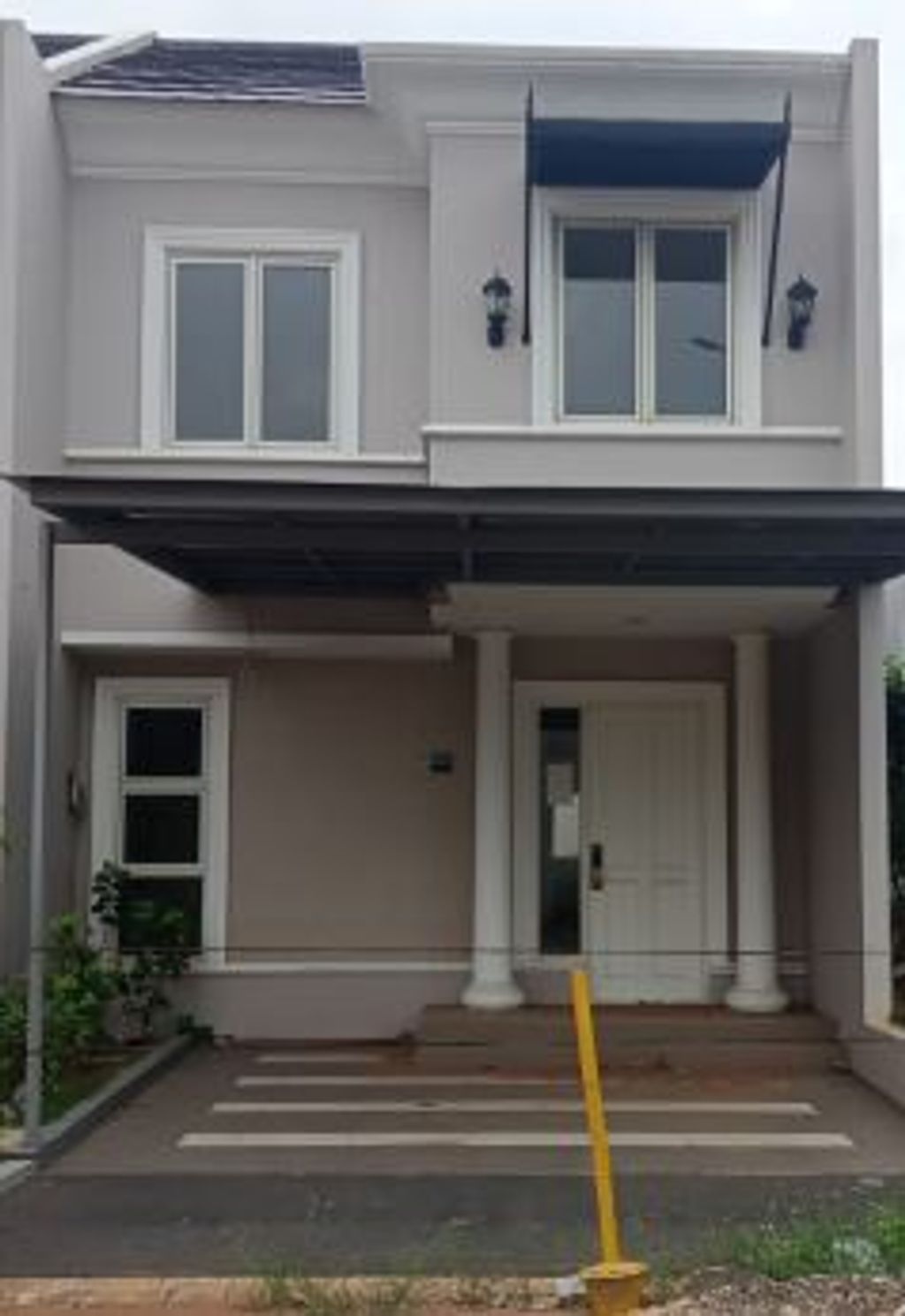 foto tampak rumah tipe T.66/200-NewLMD perumahan GRAND WISATA DISTRIK 2