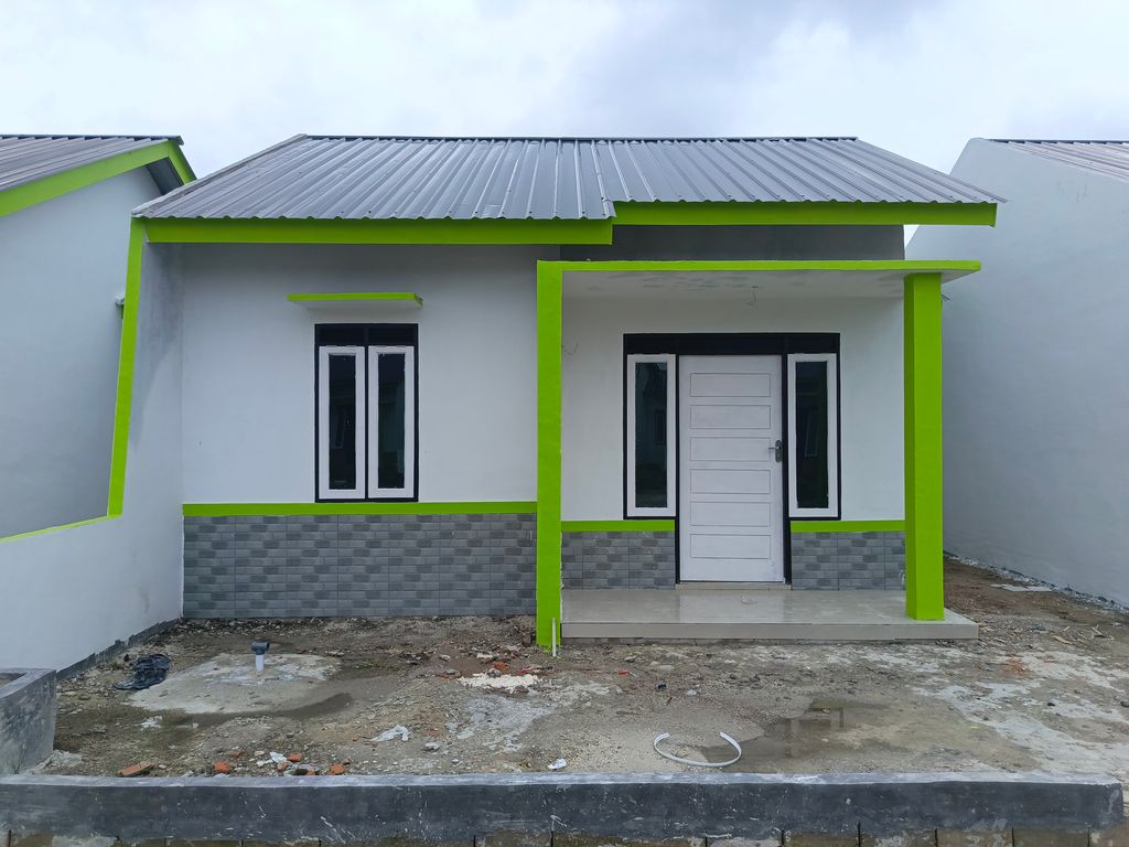 foto tampak rumah tipe 36 perumahan MUTIARA KARMILA 2