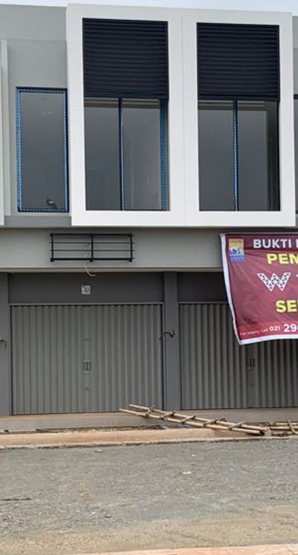 foto tampak rumah tipe T.106/50.RW perumahan GRAND WISATA ZONA 3