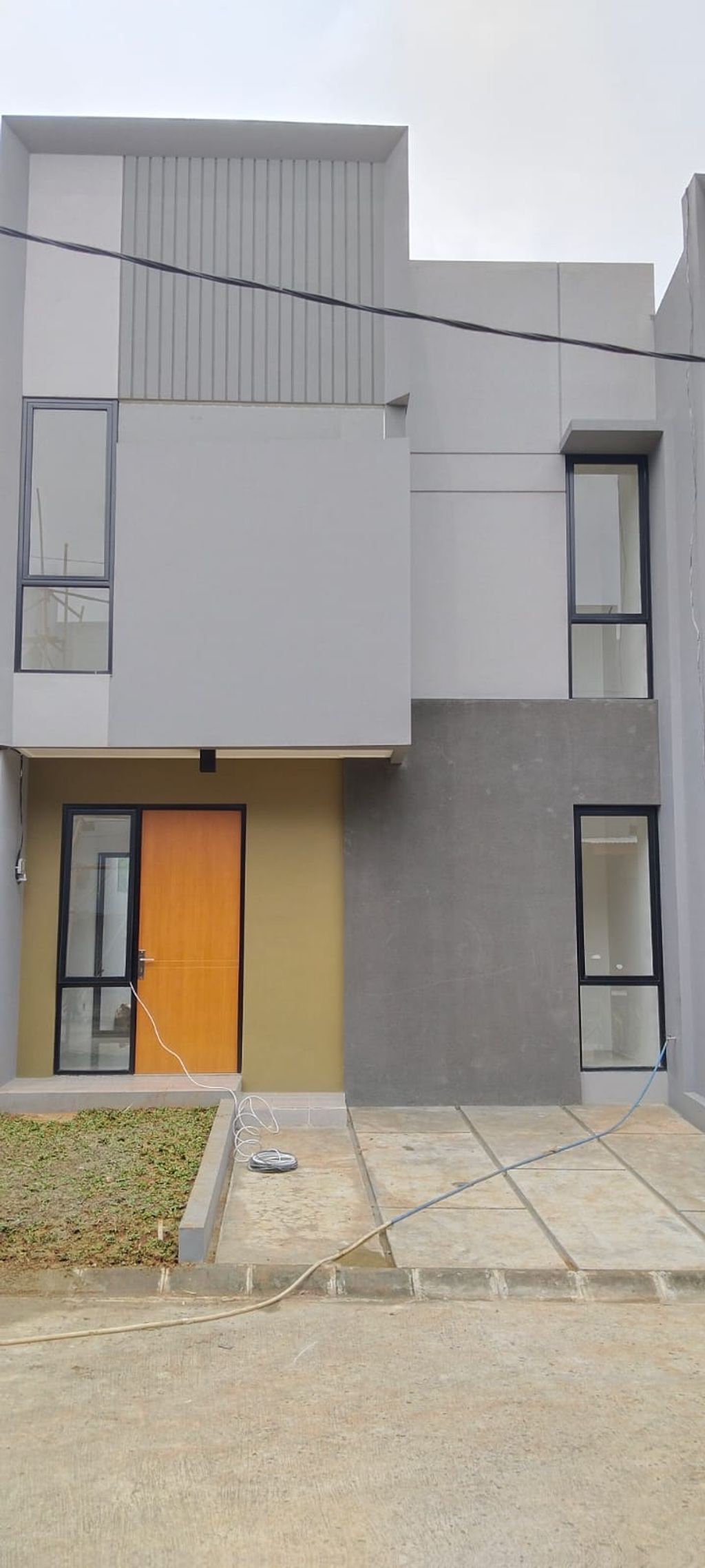 foto tampak rumah tipe 55 perumahan ARCO GREEN PARK