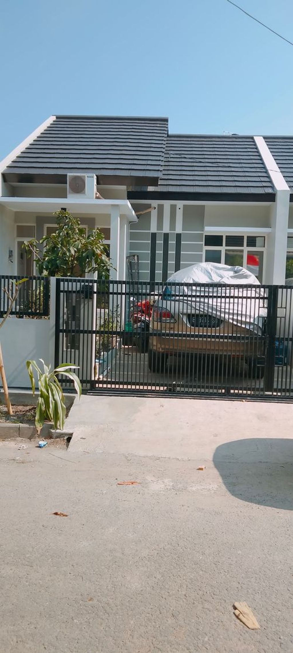 foto tampak rumah tipe H1 - 21 perumahan Taman Holis Indah II