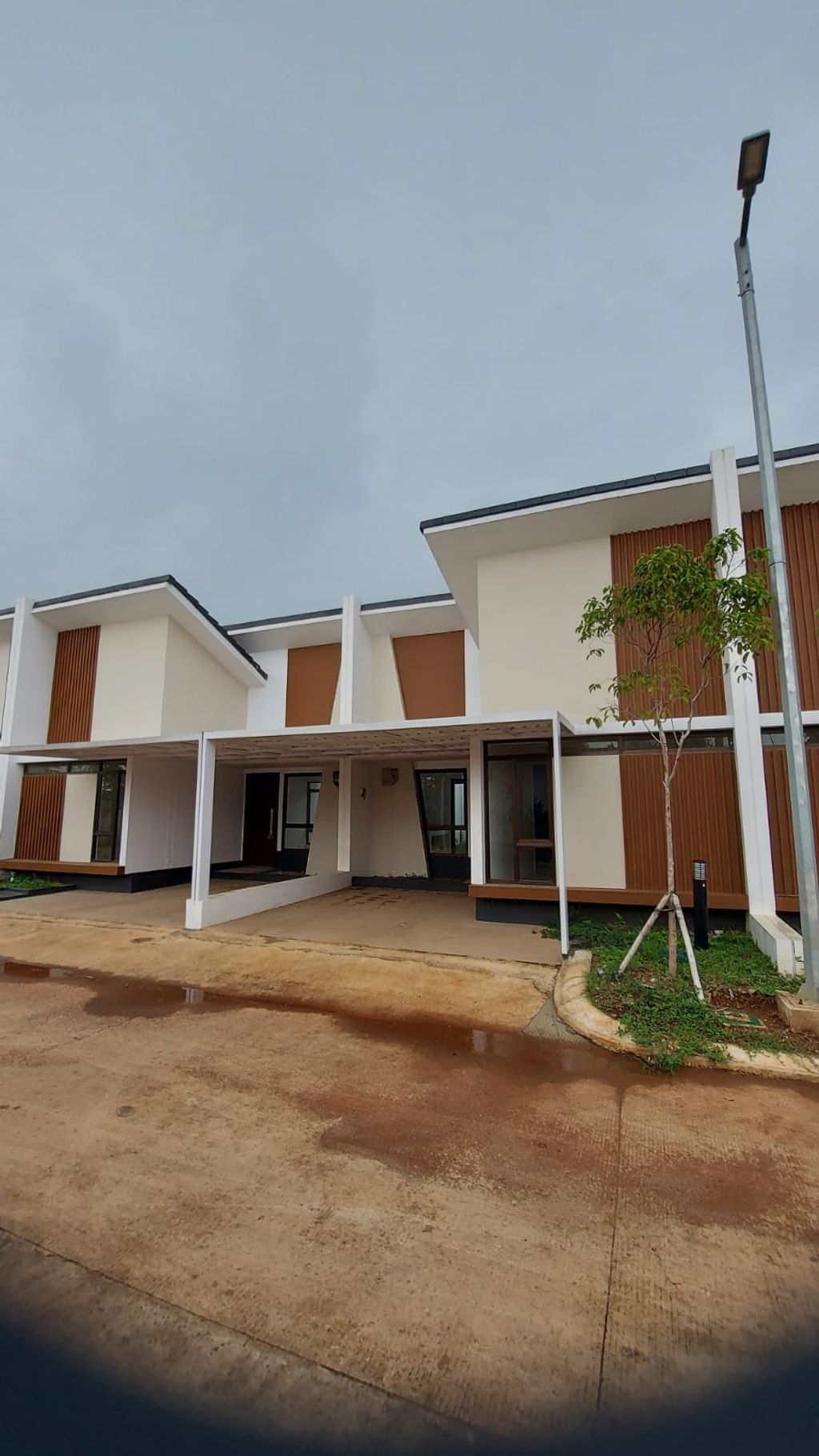 foto tampak rumah tipe H/PDG-19/02 perumahan Podomoro Park Bandung (Padmagriya)