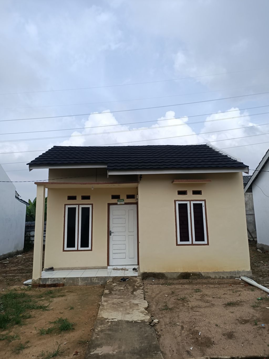 foto contoh rumah perumahan PURI HALIM 1