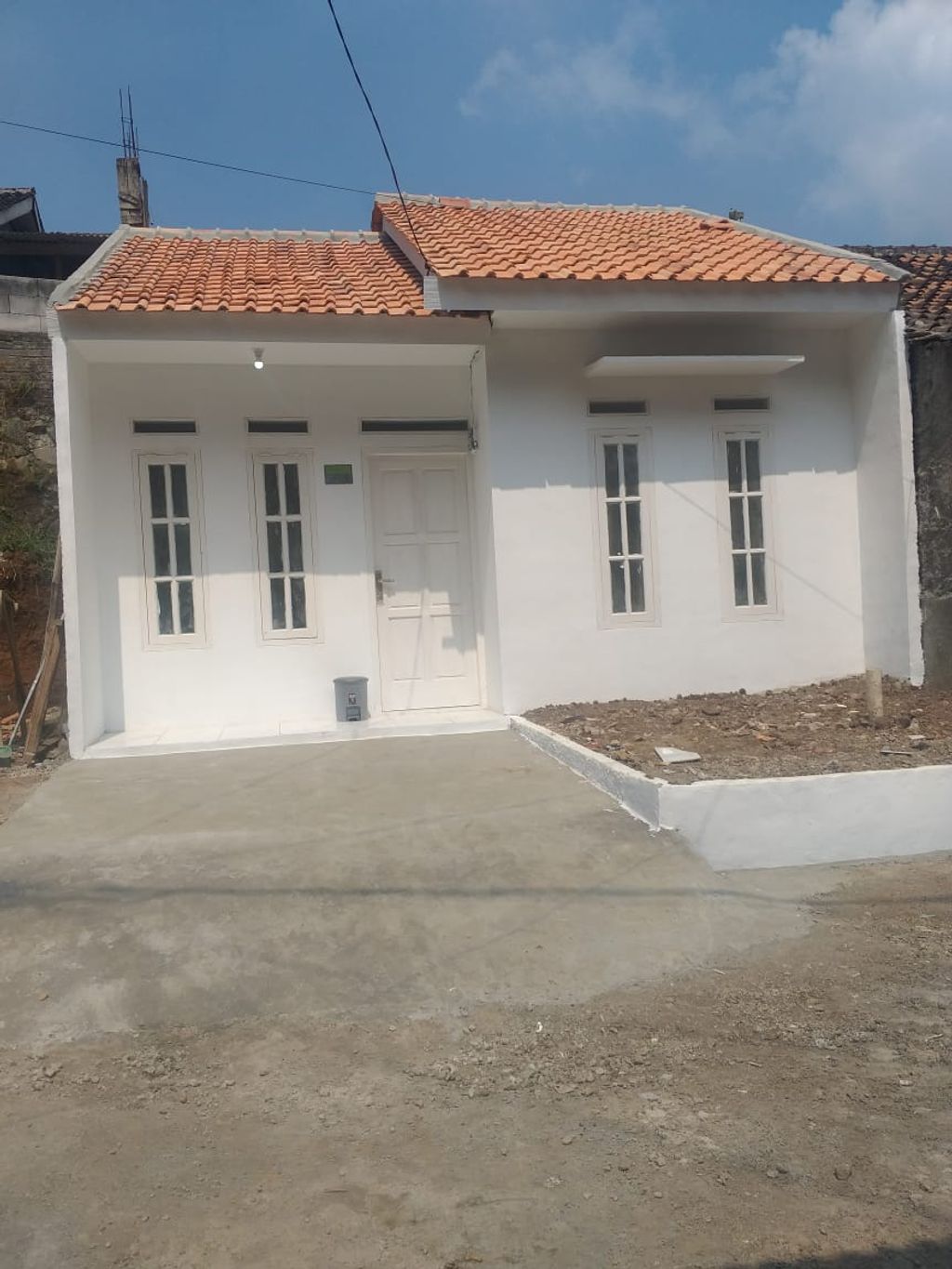 foto tampak rumah tipe 36/60 (PMK 2023) perumahan NAGRAK HILL