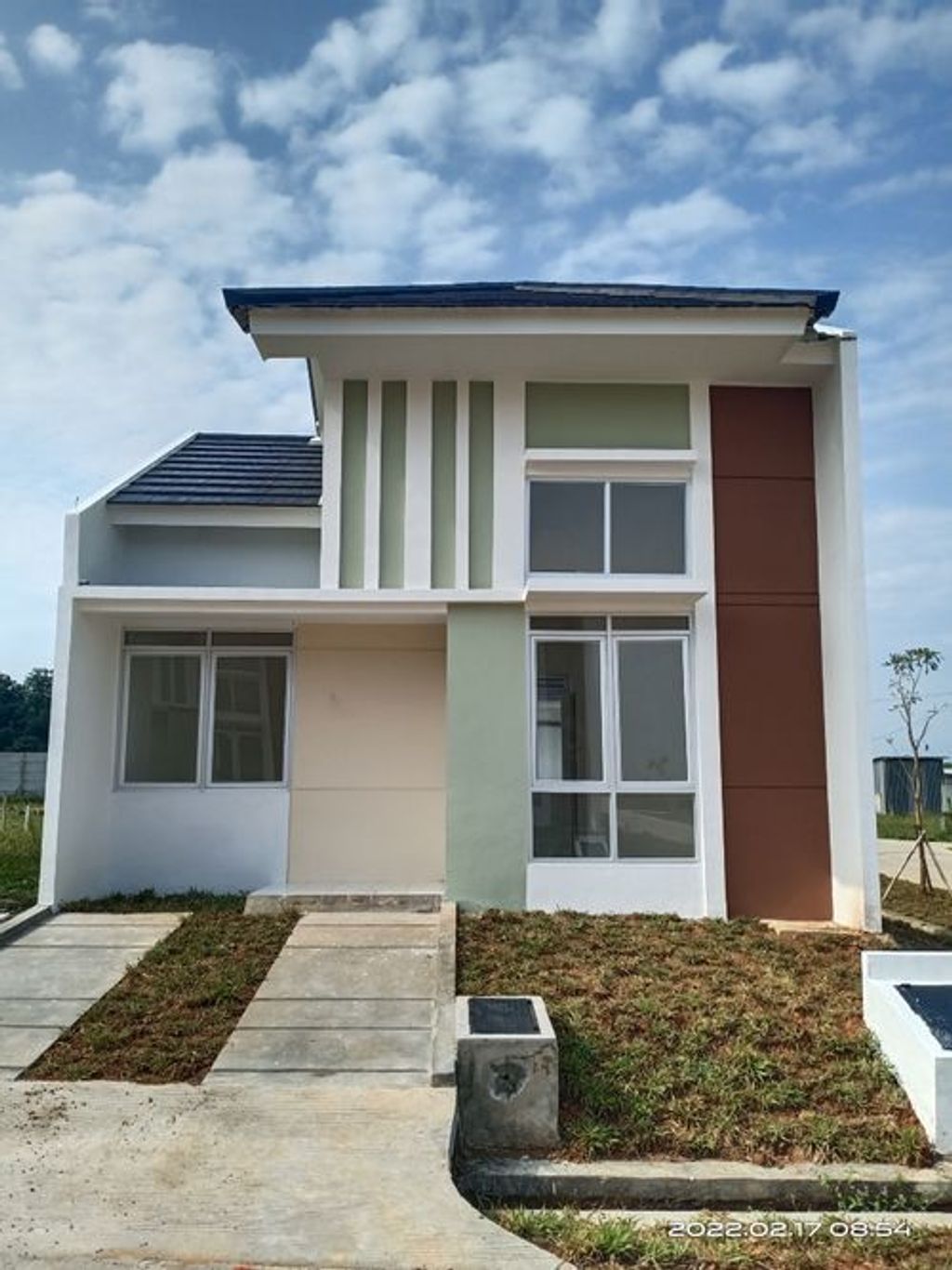 foto tampak rumah tipe RUELLIA C perumahan CLUSTER BENOA