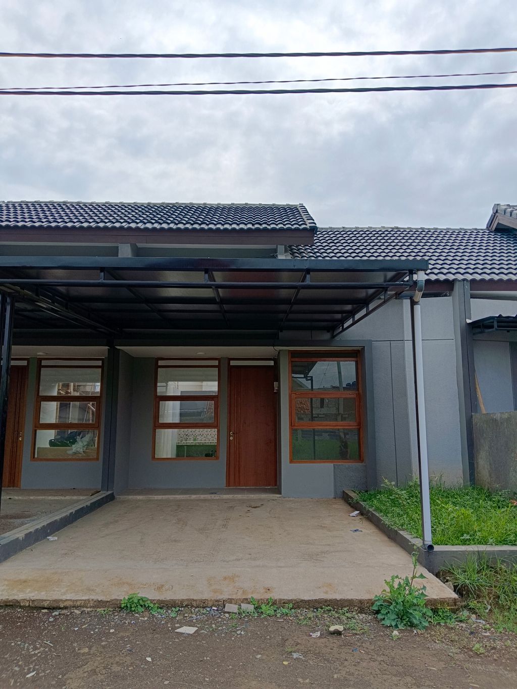foto tampak rumah tipe 36 perumahan Pesona Mekar Asri Residence