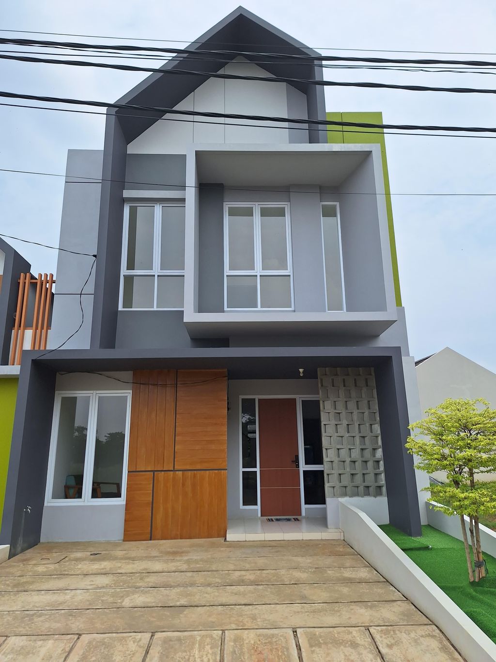foto tampak rumah tipe 66 LILY perumahan ORCHARD VILLAGE