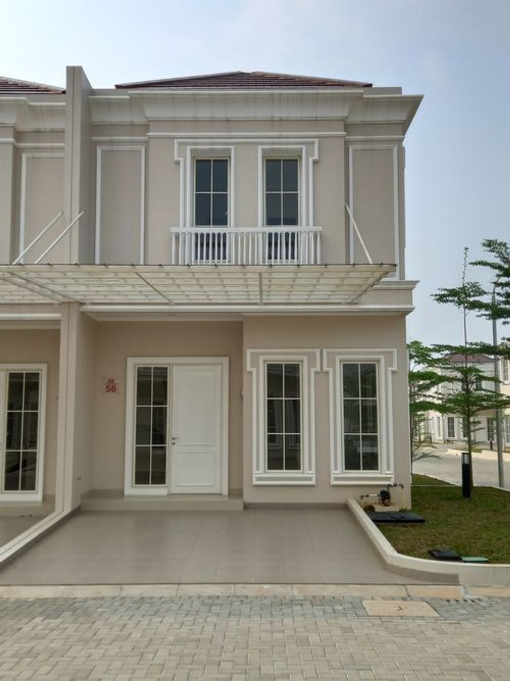 foto tampak rumah tipe 6 X 10 (Sudut) perumahan MILLENNIUM CITY TAHAP II