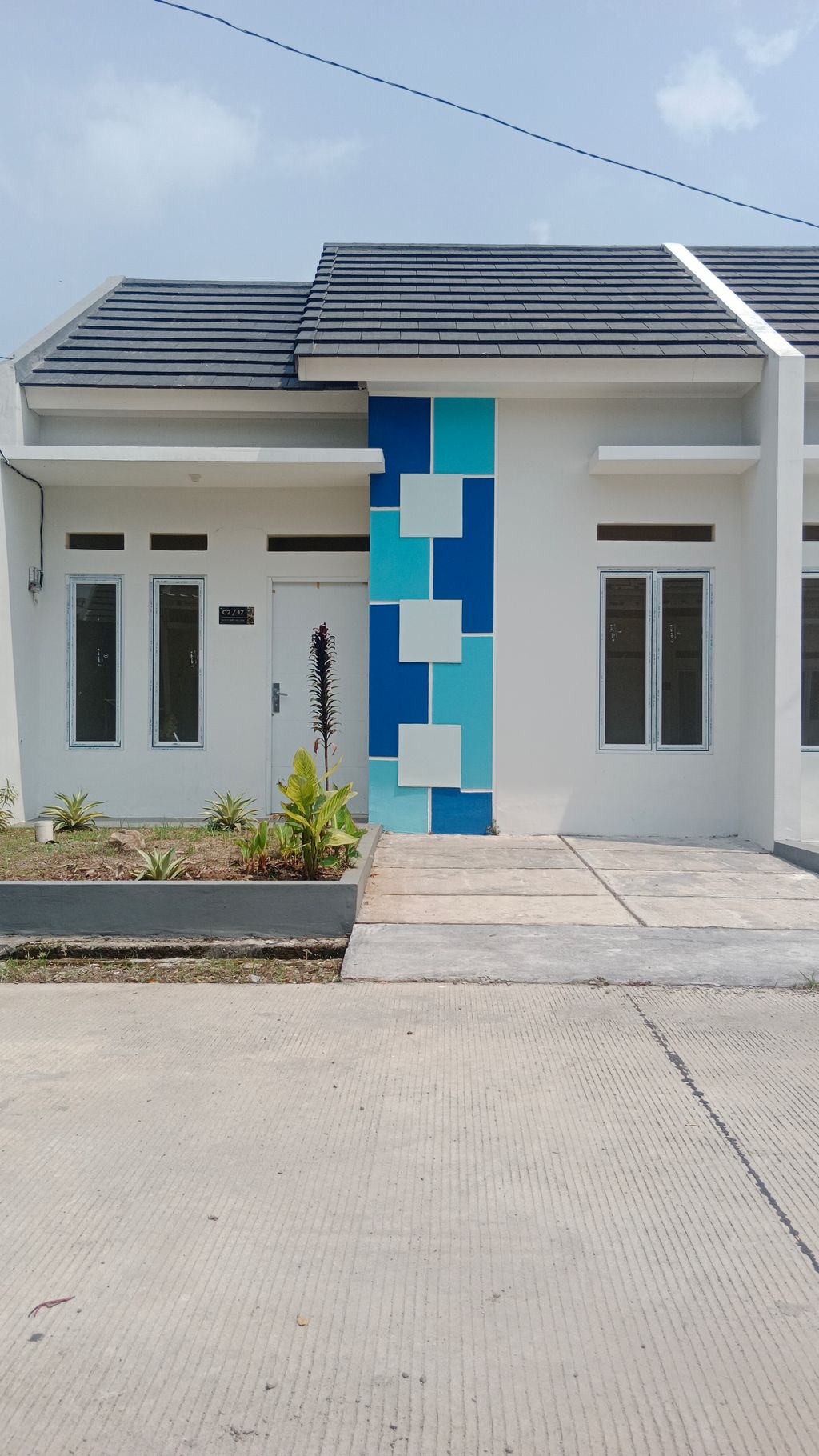 foto tampak rumah tipe AZALEA 33/60 perumahan CLUSTER BANYU BIRU VILLAGE