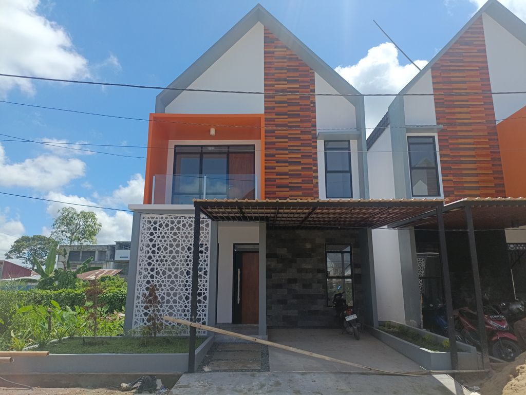 foto tampak rumah tipe Caliana perumahan Royal Mahatama (T.60)