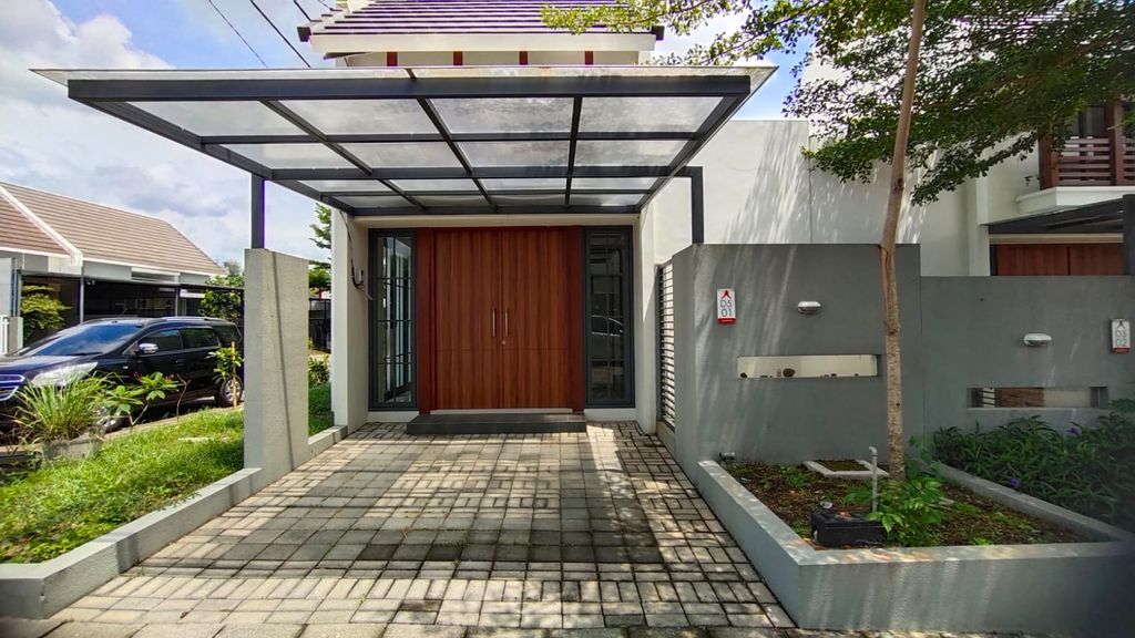 foto tampak rumah tipe Jasmine Hook New 01 perumahan GRIANAN AGUNG