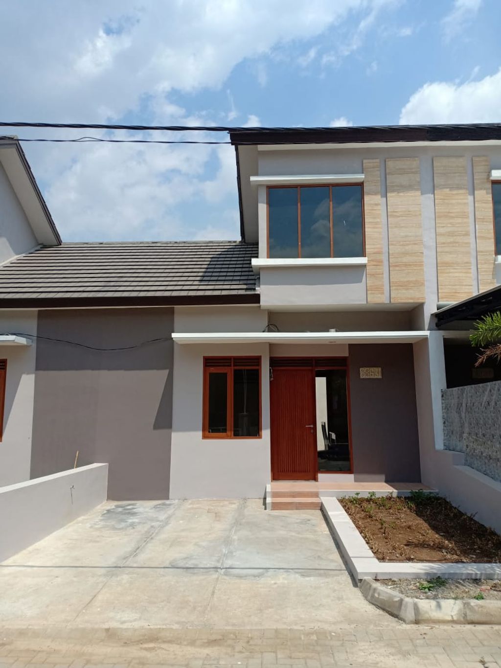 foto tampak rumah tipe 36/72 perumahan KOTA BALI RESIDENCE
