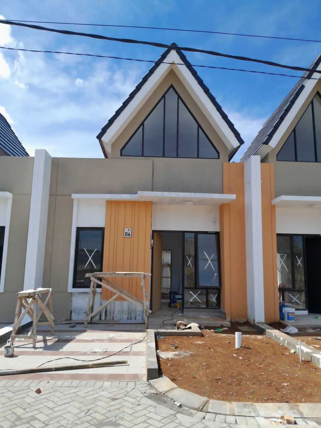 foto tampak rumah tipe 36_60 standar perumahan MUTIARA GADING 2 EXTENSION