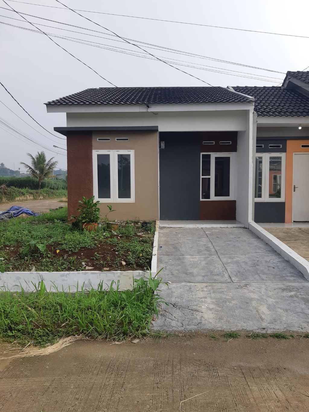 foto tampak rumah tipe 28/94 K perumahan PURI ARRAYA