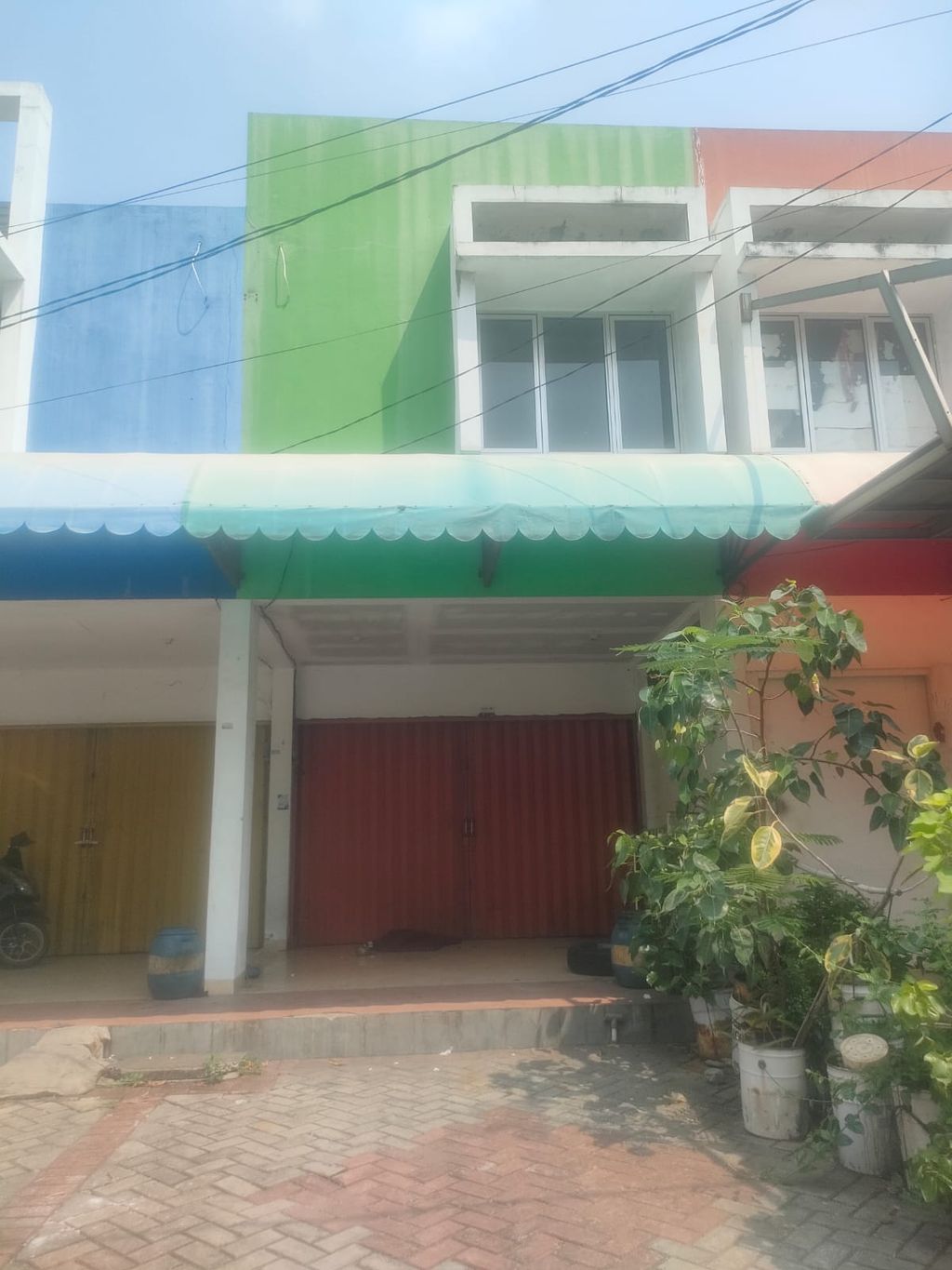 foto tampak rumah tipe ARCADE H 12 NO 25 perumahan Daan Mogot Arcadia