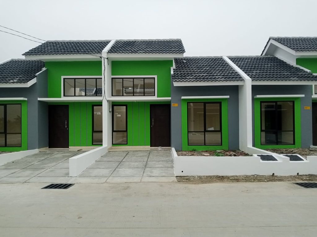 foto tampak rumah tipe JAMRUD perumahan PURI LESTARI CLUSTER PURI INDAH