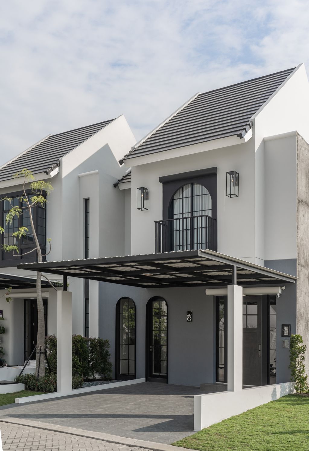 foto tampak rumah tipe BRUCE perumahan CitraLand Driyorejo CBD