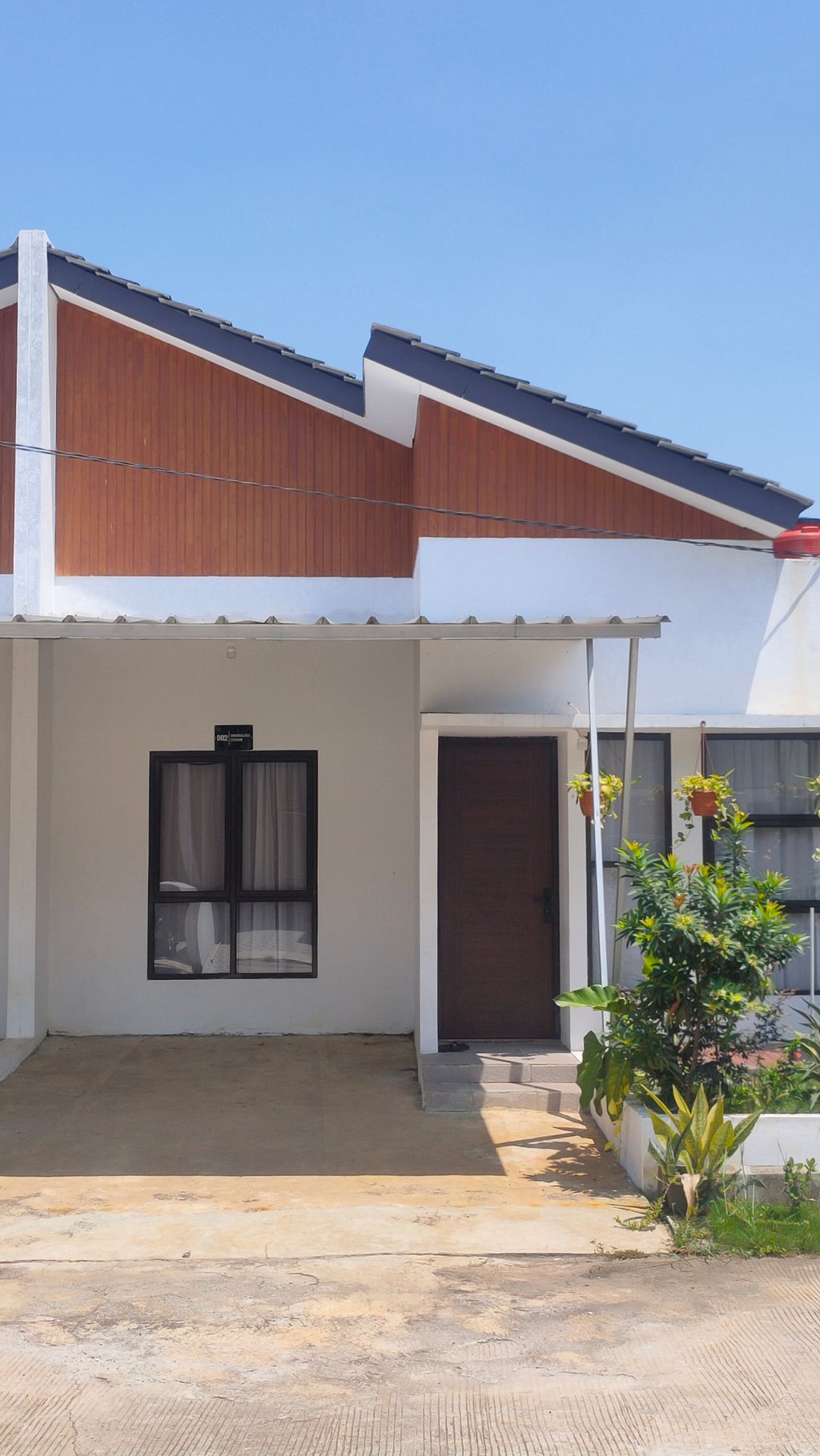 foto tampak rumah tipe 34/66 perumahan Swarnaloka Residence