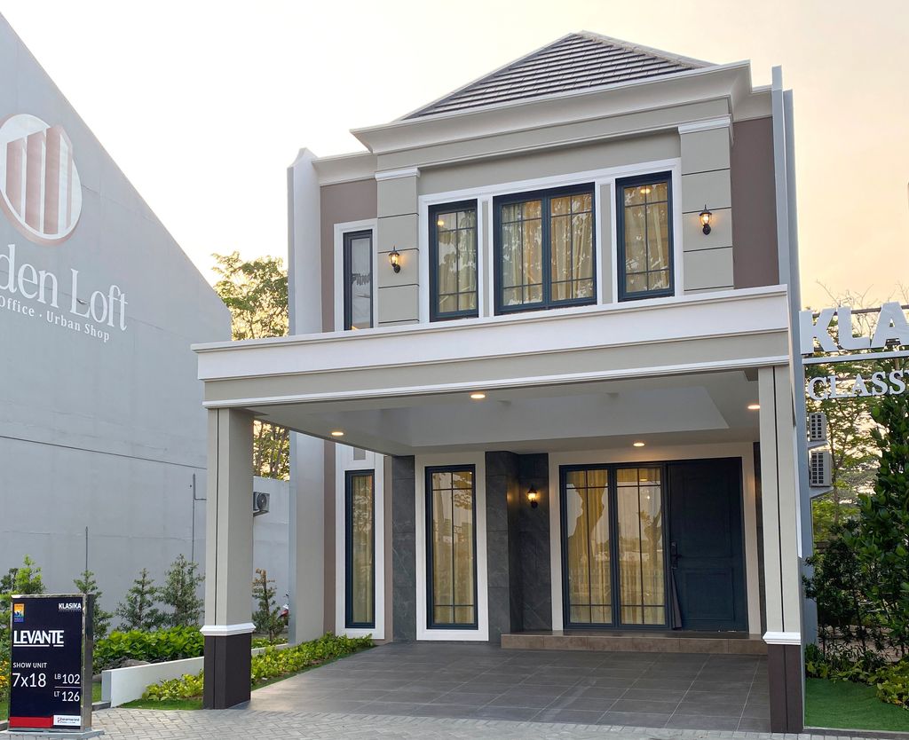 foto tampak rumah tipe T.102/130.KL perumahan GRAND WISATA - KLASIKA