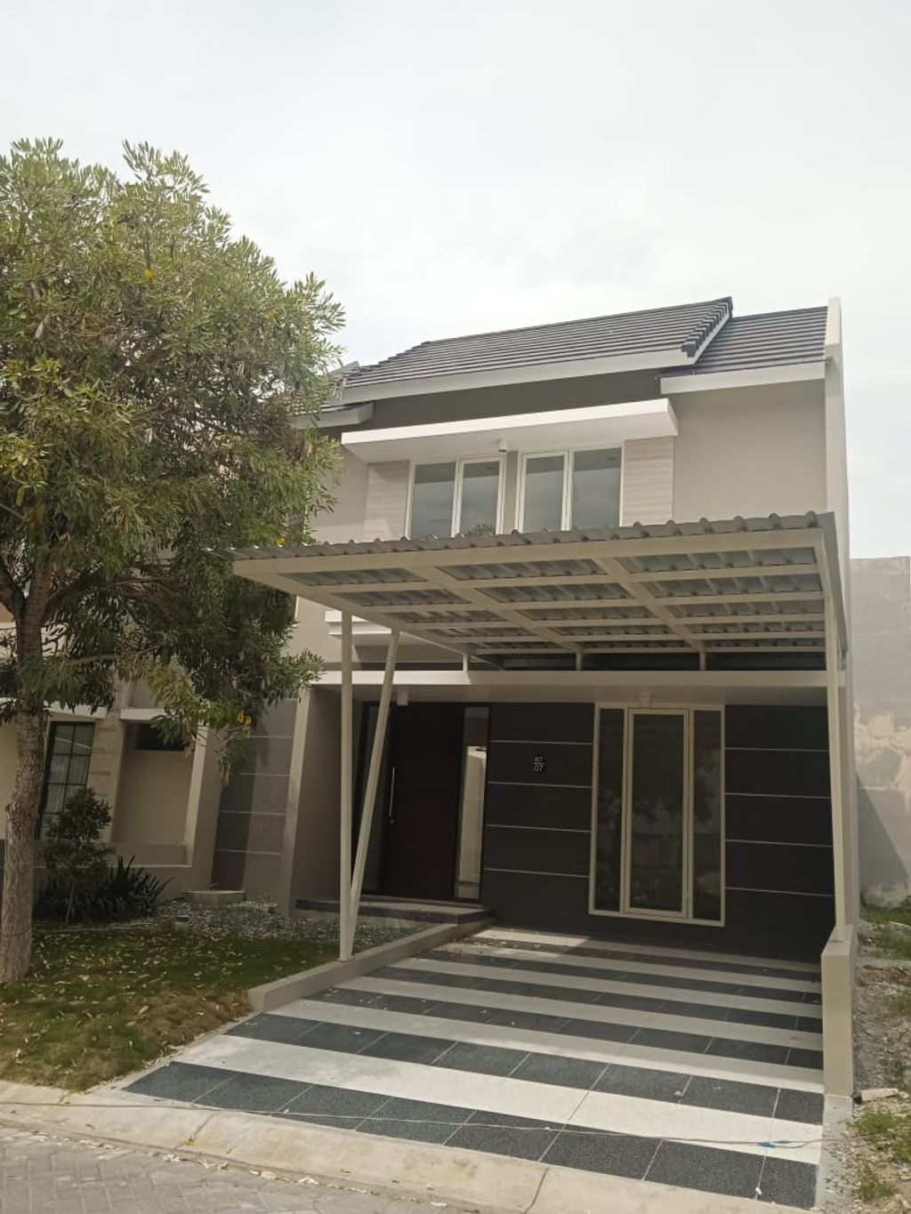 foto tampak rumah tipe AZORES perumahan CitraLand Palu