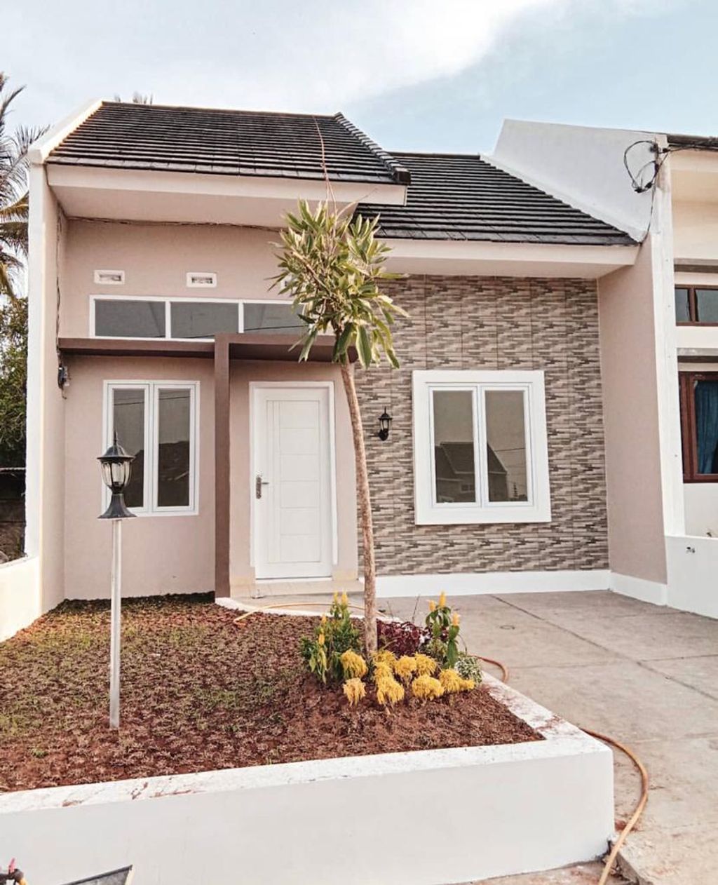 foto tampak rumah tipe 38 perumahan Green Kemiling Residence