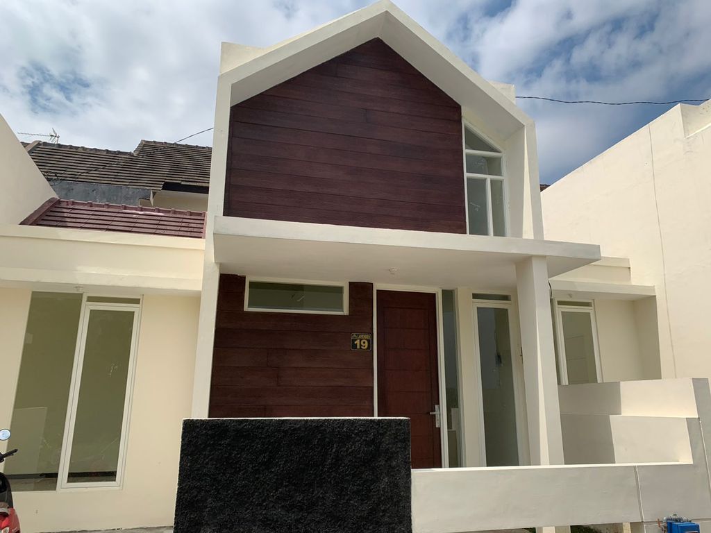 foto tampak rumah tipe Lavender 50/63 perumahan GRAHA MERJOSARI ASRI