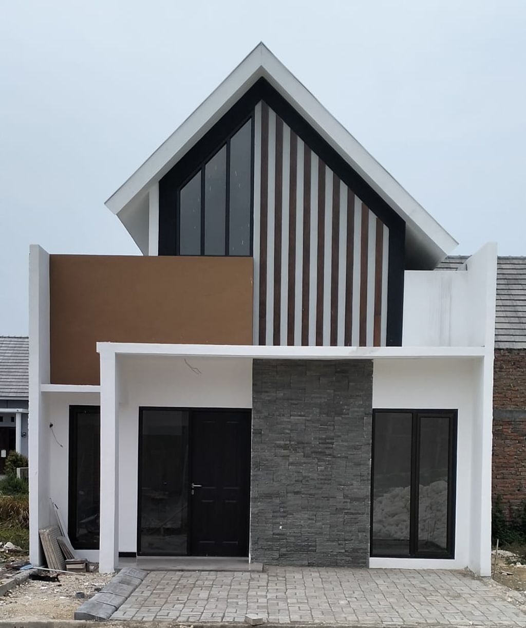 foto tampak rumah tipe SCANDINAVIAN 36/60 perumahan BHUMI NIRWANA SENTOSA