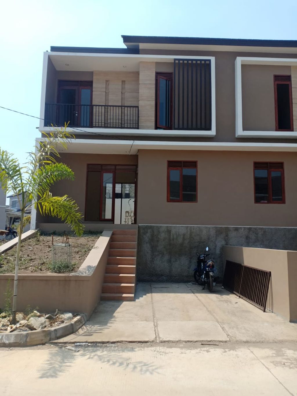 foto tampak rumah tipe 70/115 perumahan KOTA BALI RESIDENCE