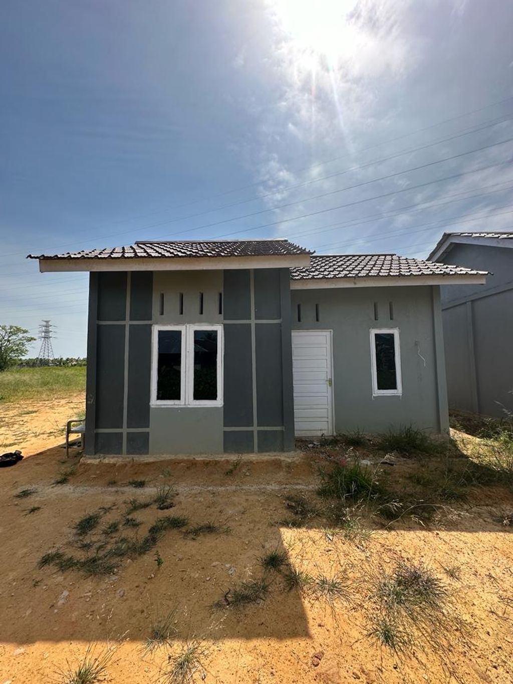 foto tampak rumah tipe 36 perumahan KARYA GRIYA RESIDENCE