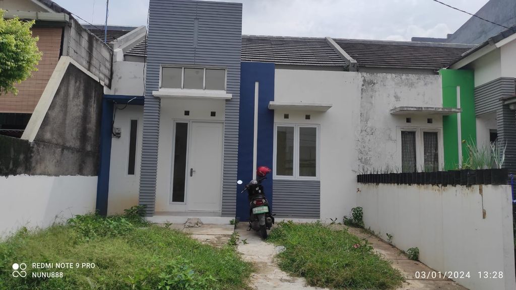 foto tampak rumah tipe 33 perumahan PERUMAHAN GRAND PELANGI CILEUNGSI