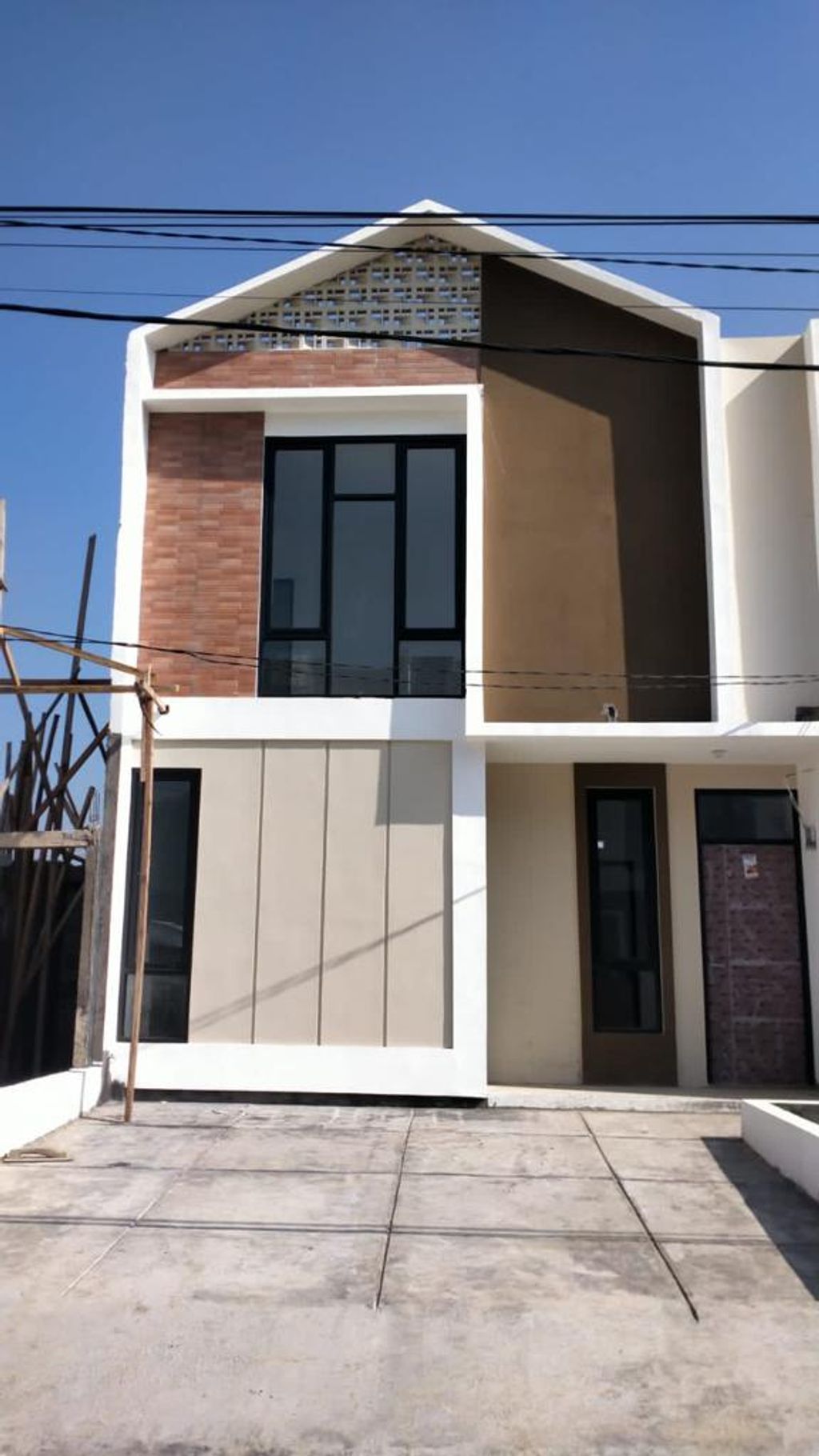 foto tampak rumah tipe 33 Mezanin (409) perumahan Griya Pataruman Asri 3