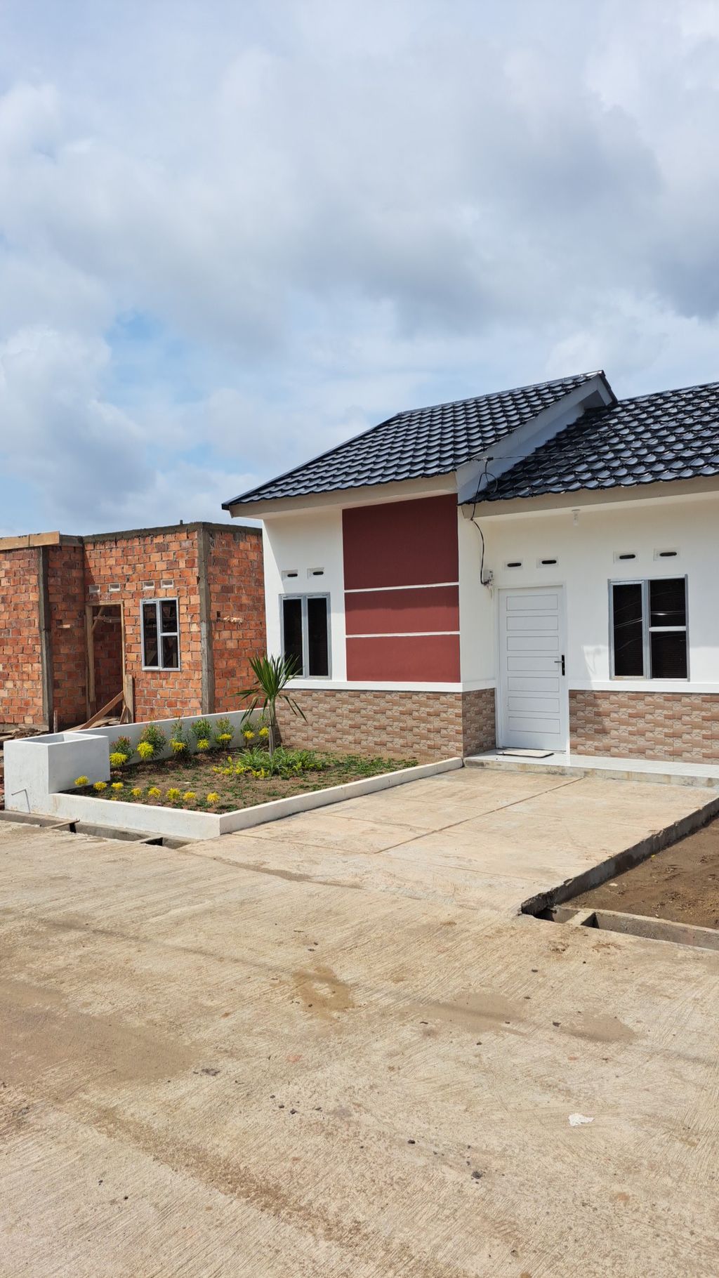foto contoh rumah perumahan Perumahan Grand Indah 2