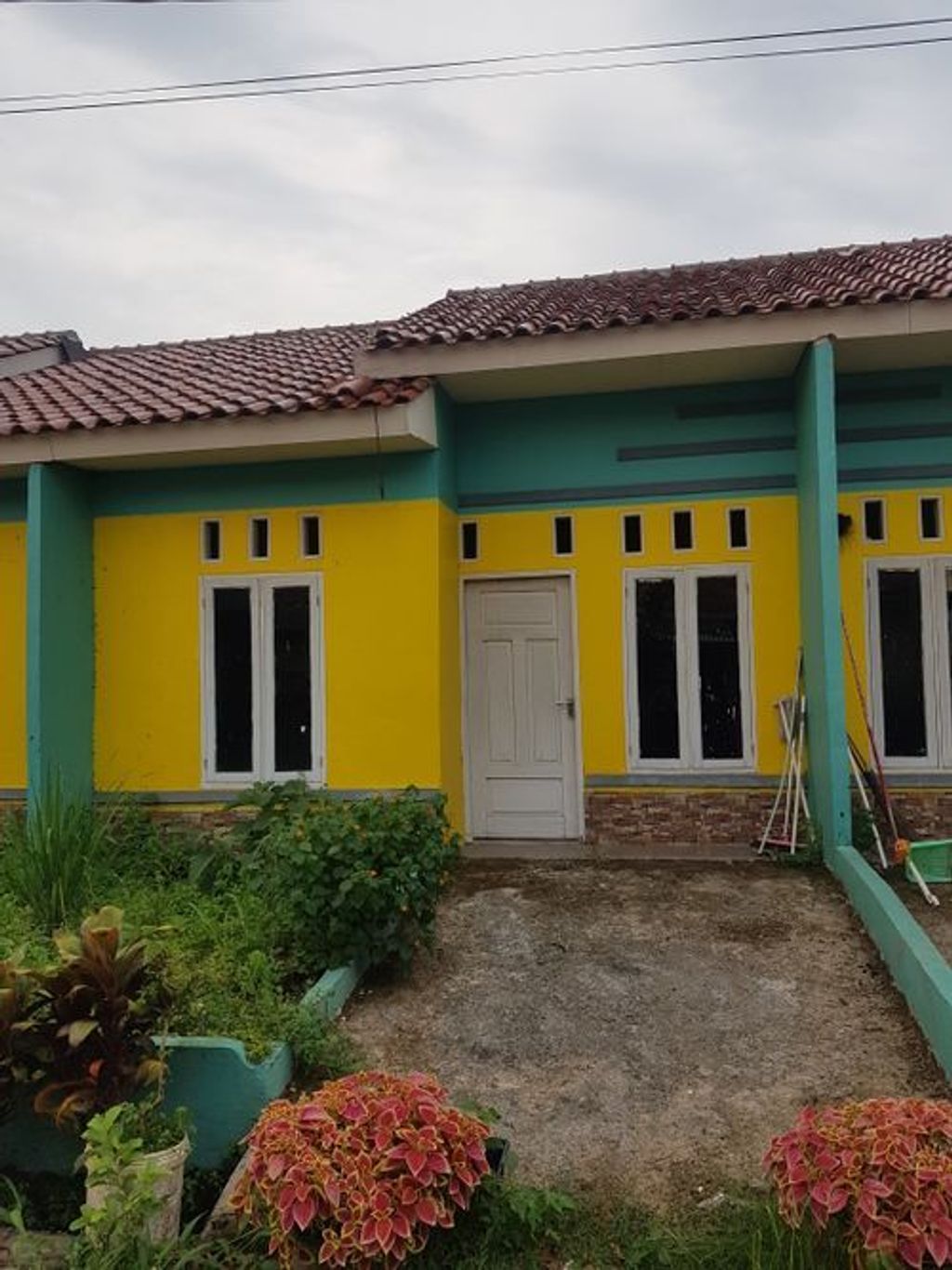 foto tampak rumah tipe SUBSIDI perumahan TAMAN KIRANA SURYA II