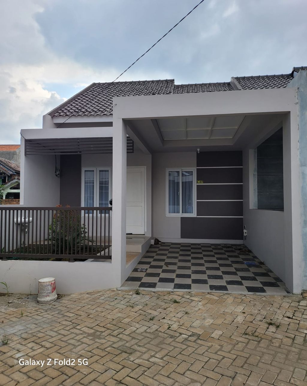 foto tampak rumah tipe 45/84 perumahan LABUHAN ALAM RESIDENCE II