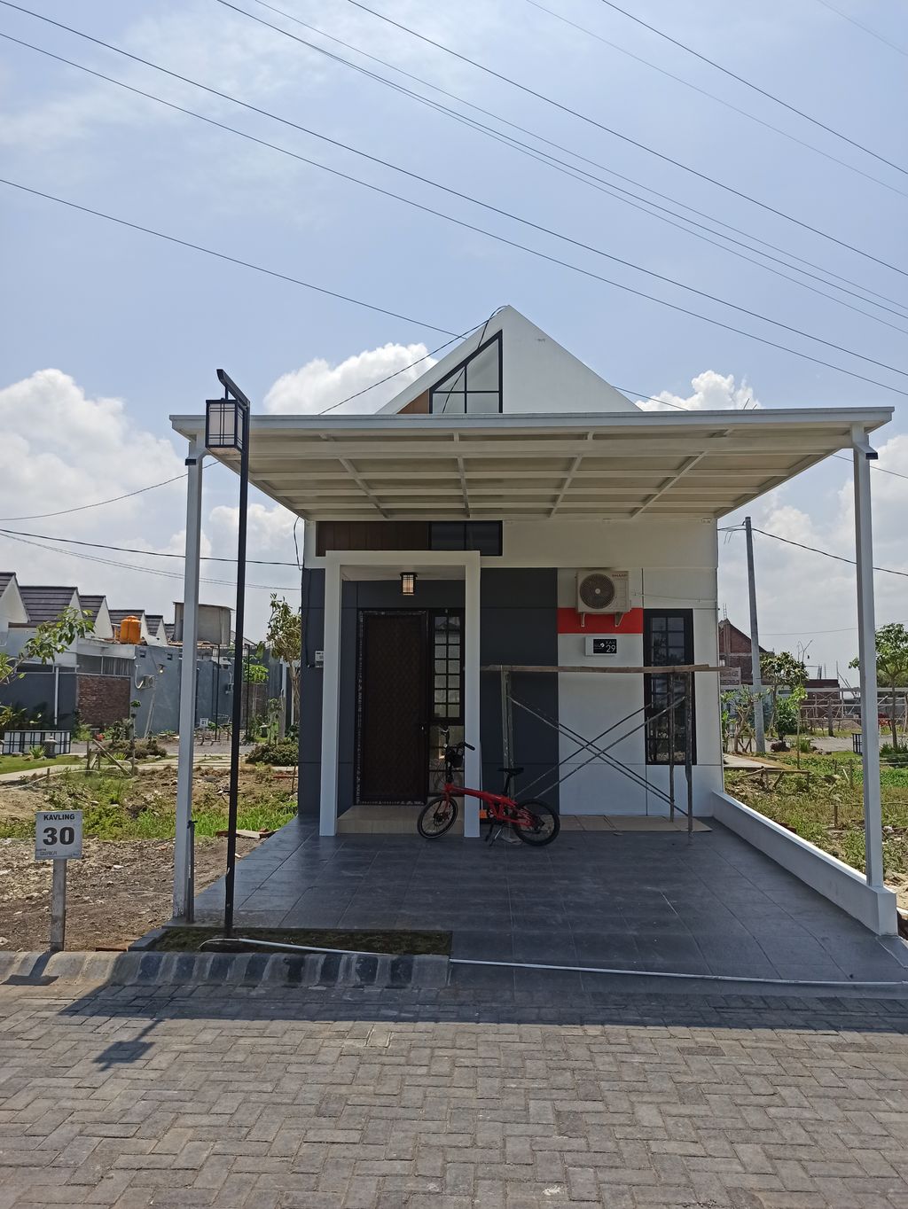 foto tampak rumah tipe osaka 2 perumahan GRHA TAMAN PELANGI 2 CLUSTER OSAKA 2