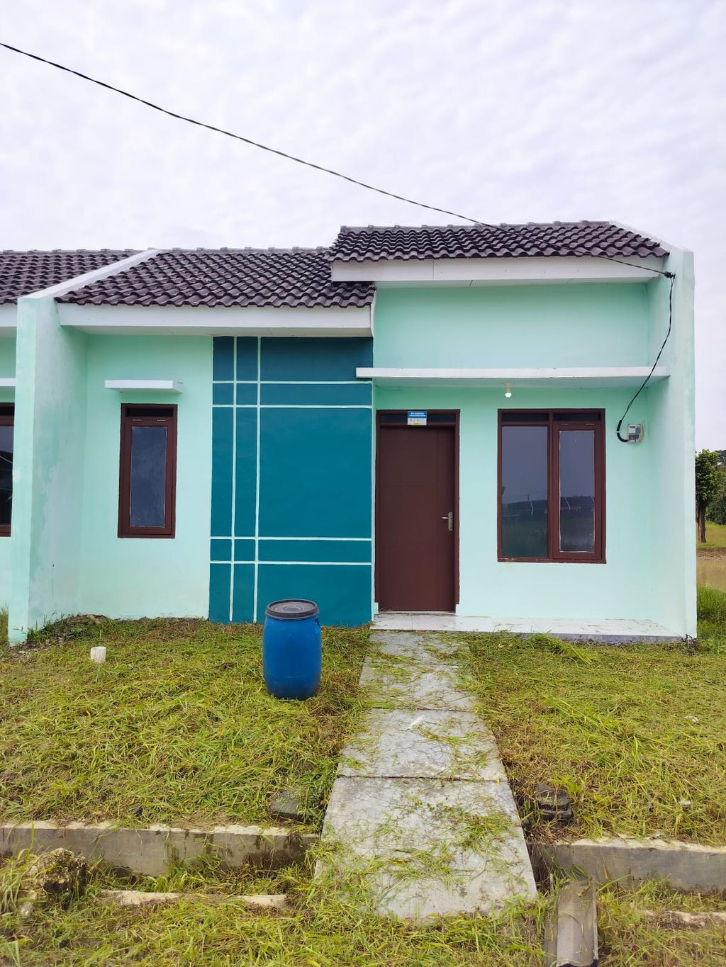 foto tampak rumah tipe FLPP 2024 29/60 perumahan Mutiara Sindangmulya Jaya