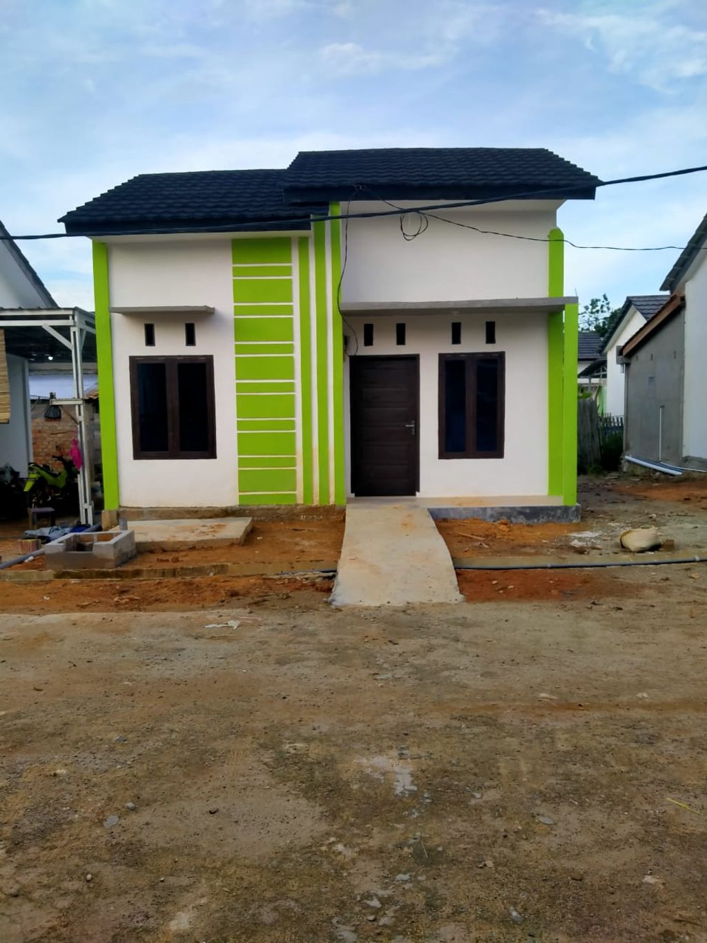 foto tampak rumah tipe 36/130 perumahan Talang Aman Residence