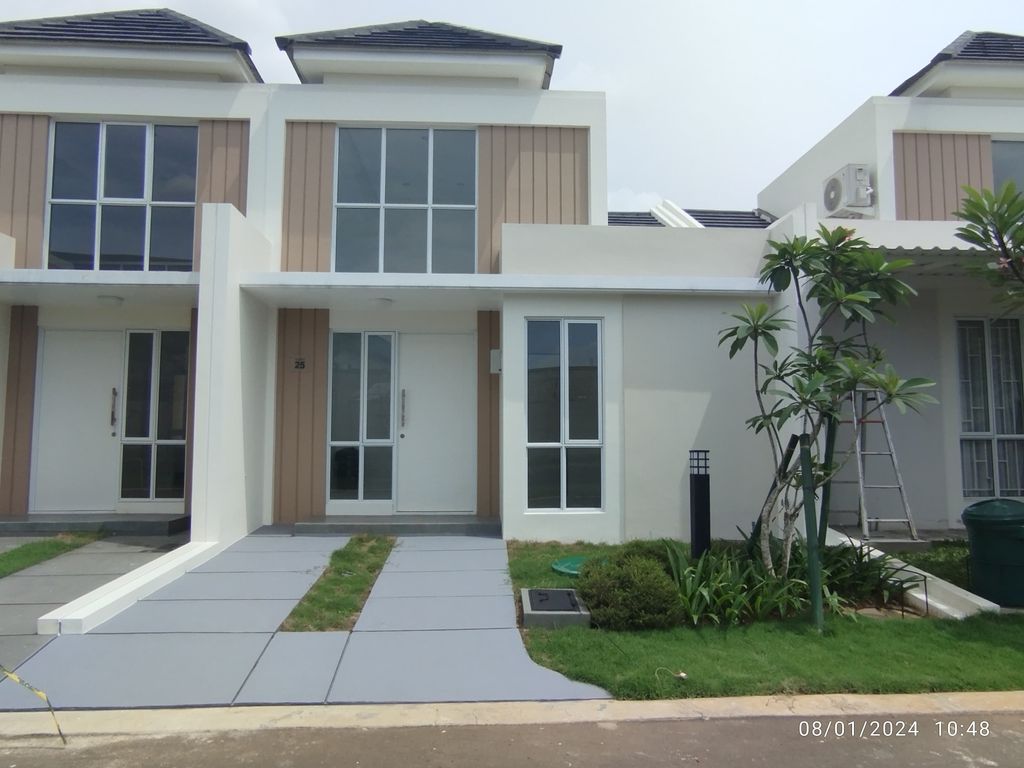 foto tampak rumah tipe ASTER 8/25 perumahan PARAMOUNT PETALS TAHAP 1