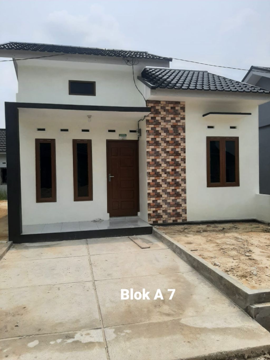 foto tampak rumah tipe 36 perumahan BUMI KERINCI PERMAI V