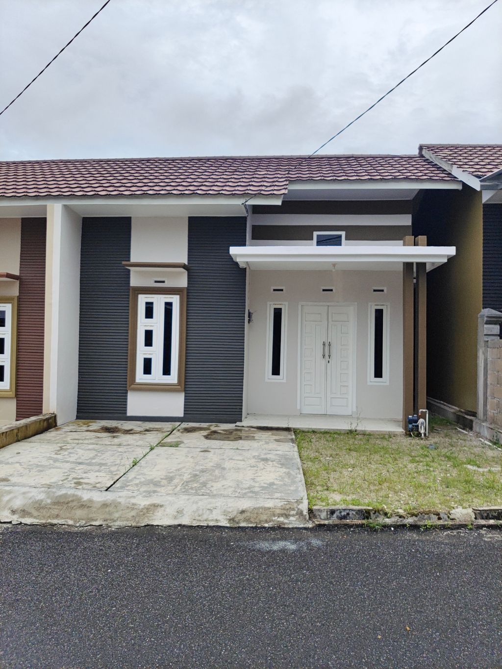 foto tampak rumah tipe 56/84 perumahan Ketakong Indah Residence