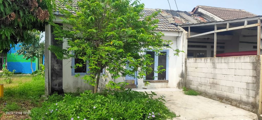 foto tampak rumah tipe Standar perumahan TRIRAKSA VILLAGE