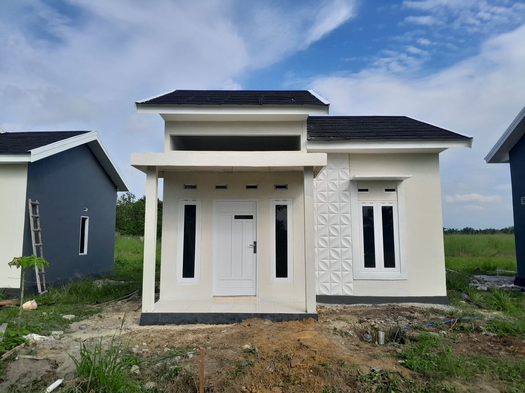 foto contoh rumah perumahan KHARISMA BELAMAN