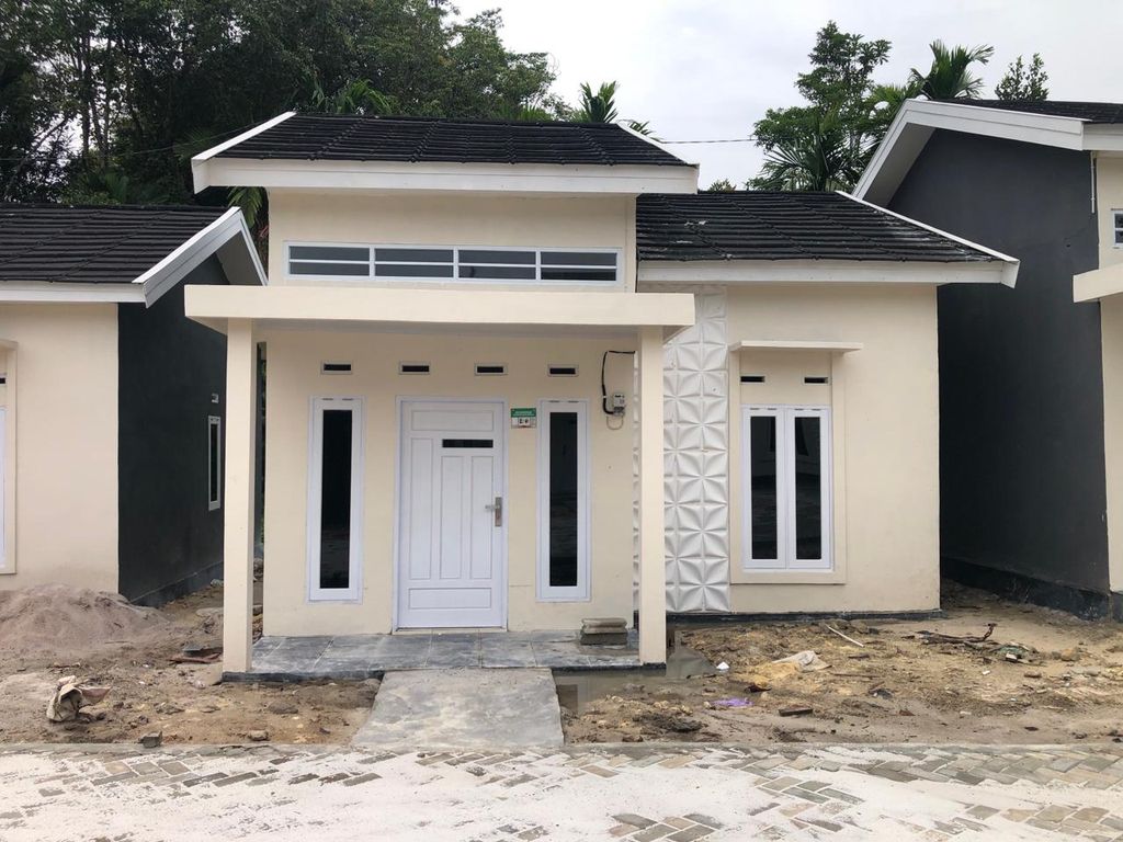 foto tampak rumah tipe 36 ORCHID 182 perumahan KHARISMA LAND PARK