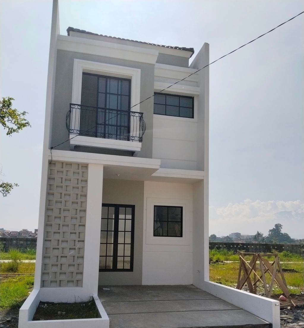 foto tampak rumah tipe 50 Compact Classic Atap Jurai perumahan G-Land Canola Residence