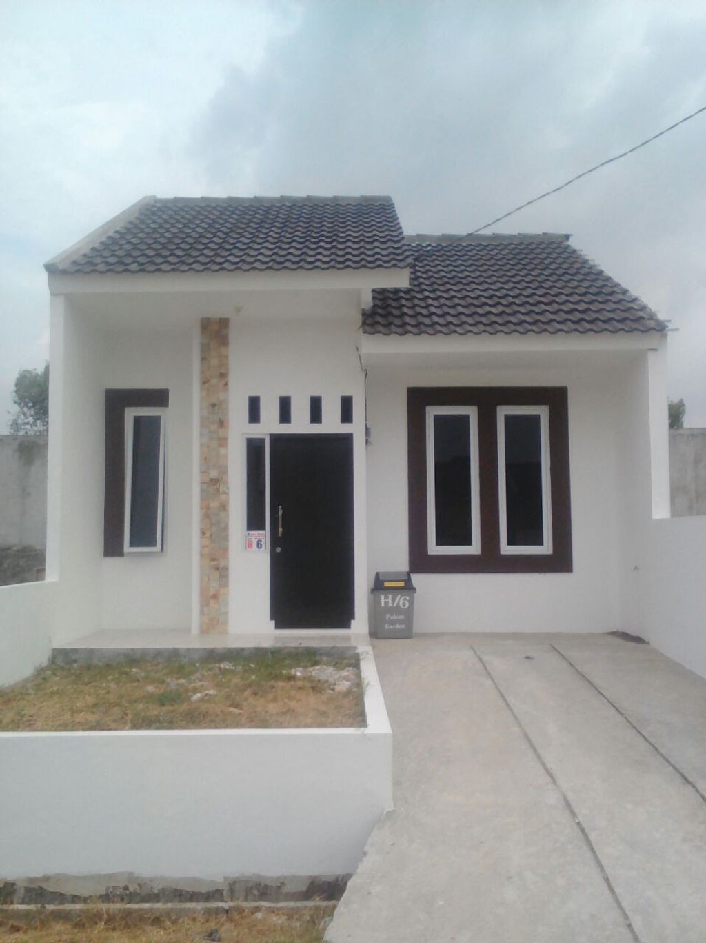 foto tampak rumah tipe 36/105HOOK perumahan PALEM GARDEN JATIREJA